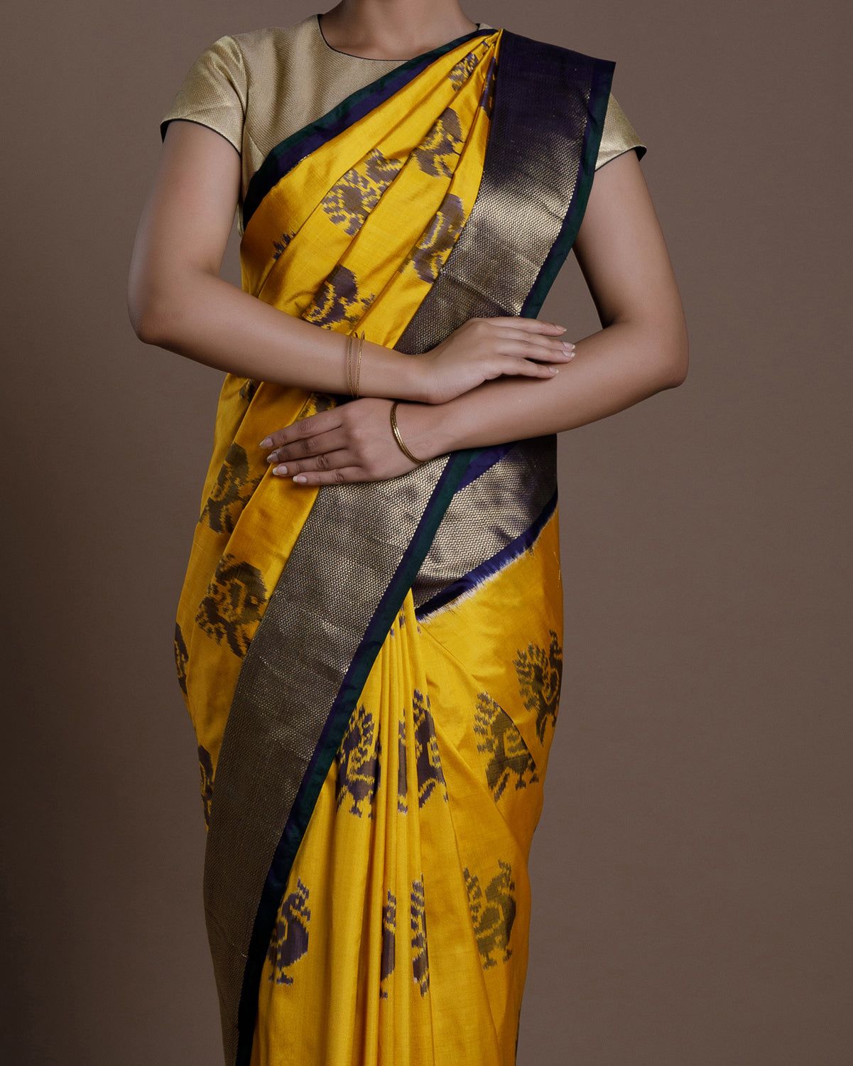 Tvis and Bliss. Lemon Yellow and Blue Pure Cotton saree with Allover Butta  and Floral Border